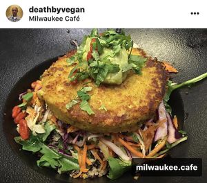 Vegan Veggie Burger over Asian Slaw served with Guacamole and Hummus  at Milwaukee Cafe in Biarritz