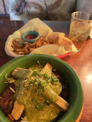 Jungle curry bowl with tofu, and large fries  at Hula's Island Grill in Santa Cruz