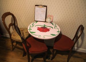 One of our flowered table, ready to welcome you !  at Sibylles - Tattoo Salon & Tea Room in Bordeaux