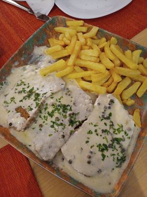 Seitan con salsa de pimienta at Raices in Granada