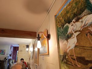 Tienen también cuadros expuestos, que están a la venta. at Raices in Granada