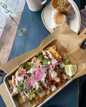 Moody chilaquiles and cauli & smoked tofu wrap   at Old Crow Coffee Co. & Moodswing Coffee in New Westminster