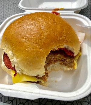 Double burger with bacon and cheese at The Vegan Grill in Croydon