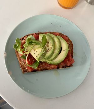 Avocado and tomato tostada 🥑  at Dulces Dreams in Malaga