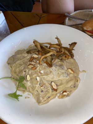 Creamy mushroom pasta made vegan - make sure they understand you want to make it vegan!! It usually has cow cheese and cow butter  at Like Coffee in Cat Ba