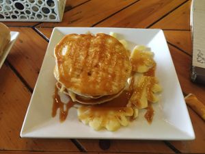 Pineapple pancakes with caramel syrup! at Like Coffee in Cat Ba
