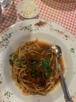 Spaghetti puttanesca, delicious! Added the vegan cheese at Arrivederci Pizzeria in Milton