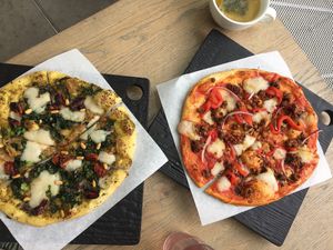 Sweet Pepper+Sausage and Ultraviolet pizzas at Virtuous Pie - UBC in Vancouver