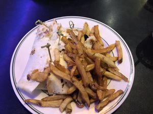 Vegetarian burger-lunch special. 
They were out of the Impossible Burger, the lunch special was a vegetarian burger so I had that in a tortilla. Very very good.  Definitely go bac at Plaza Cafe in Santa Fe