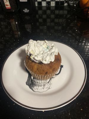 Vegan Carrot Cupcake w/Half Frosting (Dry IMO, Ate 1/2)  at Merit Vegan Restaurant in Sunnyvale