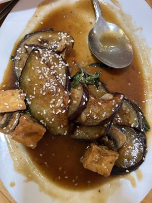 Sesame eggplant -half eaten lol  at Merit Vegan Restaurant in Sunnyvale