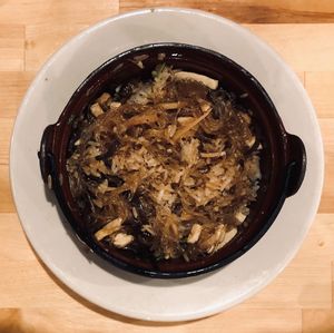 Rice clay pot w/ seasoned tofu, seitan, mushroom, bean threads, onion & ginger
 at Merit Vegan Restaurant in Sunnyvale