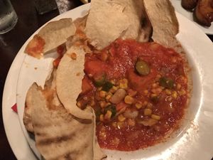 My Southern Roots... not like picture. Very liquidity. I broke up the tortillas though. Too bad because I was really looking forward to what the other reviewers meal looked like at Riverwalk at Tin City in Naples