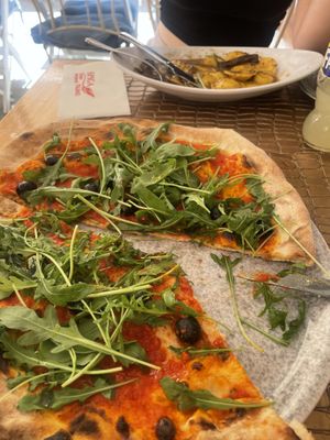 Marinara pizza with rocket & olives  at Spiga in Alicante
