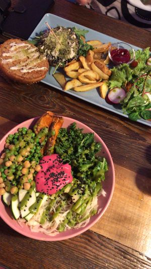 Pink hummus bowl and portabello burger! at RoseHip Vegan Kebabs in Vilnius