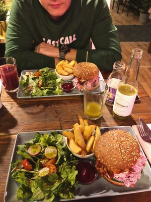 my non vegan bf’s fav- jackfruit burger, it has extraordinarily taste but hard to eat because of texture at RoseHip Vegan Kebabs in Vilnius