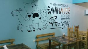 translates to "in this kitchen, the animals are not ingredients, they are friends" 💕 at Taco Station in San Andres Cholula