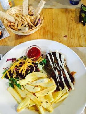 Home made chips and veggie burger can´t taste any better than this!  at Bar Ecologico Gaia in Sevilla