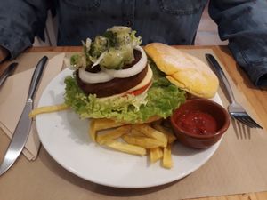 Vegan burger in turmeric bun - delicious! at Bar Ecologico Gaia in Sevilla