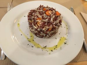 Paella with carrots, onion and mushrooms.  at Bar Ecologico Gaia in Sevilla