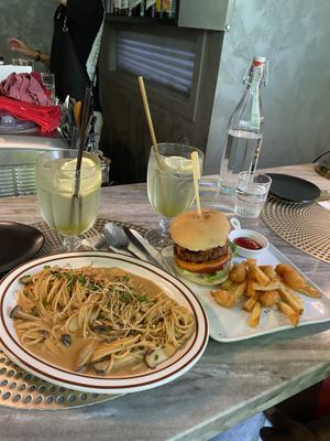 Mushroom pasta and beyond burger. Green grape ade for drinks. Water is complimentary as per Korean standard  at Monk's Butcher - Itaewon in Seoul