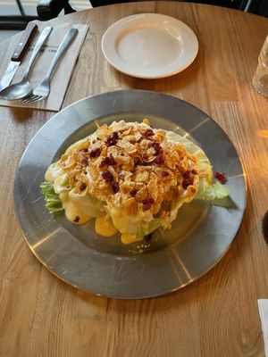 Iceberg lettuce mango corn flakes salad thing  at Monk's Butcher - Itaewon in Seoul