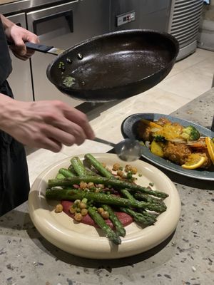 Chef is making our food at the open kitchen   at Monk's Butcher - Itaewon in Seoul