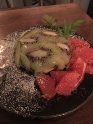 Chocolate mousse hidden underneath the nicely arranged kiwi fan at Monk's Butcher - Itaewon in Seoul