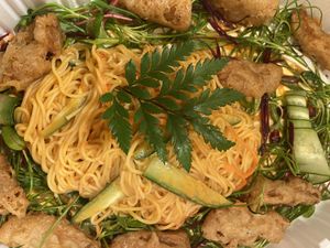 This zoomed in photo lmao but peanut soba noodles with deep fried mushrooms  at Monk's Butcher - Itaewon in Seoul