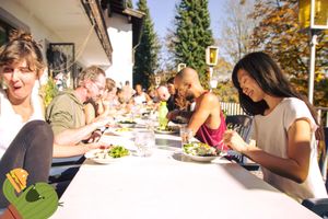Since our guests are currently visiting yoga training, it is jam-packed at lunch time. Everyone enjoys the Sun, exciting discussions and the well-known good mood. at Nature Community in Schonsee