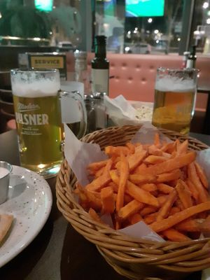Great sweet potato fries and house lager. at O'Learys - Sollentuna in Sollentuna