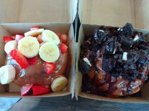 Custom with chocolate sauce, strawberries and banana. And TheBomb dot com at Cinnaholic in Boca Raton