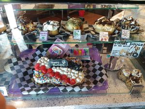 Glass case showing some of their offerings. at Cinnaholic in Boca Raton