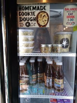 Their delicious vegan cookie dough is available To-Go or as a topping on a cinnamon roll. at Cinnaholic in Boca Raton