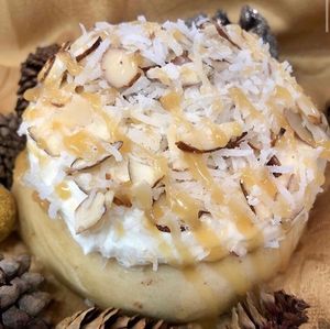 Marshmallow Frosting, Shredded Coconut, Almonds & Caramel Sauce!  at Cinnaholic in Boca Raton