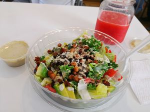 Kale Cesar Bowl, great food but why so much plastic  at Adhana in Santiago