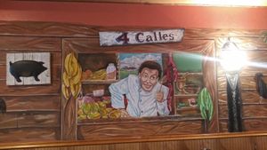 Inside wall art at Lechonera El Coqui in Jacksonville
