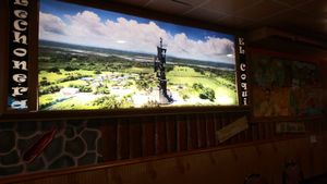 Inside wall art at Lechonera El Coqui in Jacksonville