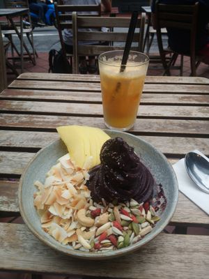 Açai bowl and fresh orange juice. at Sarnies in Central Singapore
