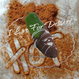 Fiery Napoleon: a daring twist on Indulgence. Just imagine a jalapeno filled with our rich ganache, then dipped in our signature chocolate blend. Dairy Free Option.  at I Live For Dessert in Livermore