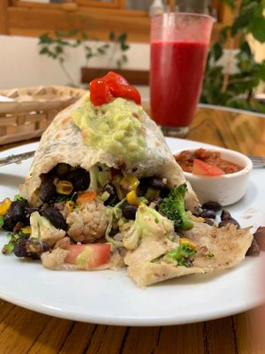 After a month I Came back to Cuenca for the same Santa Monica Burrito. Only gluten food I would eat in Ecuador. This vegan burrito is incredible!  at Cafe de Nucallacta in Cuenca