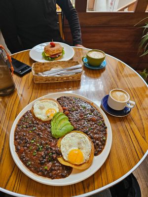 Oat milk coffee, huevos rancheros at Cafe de Nucallacta in Cuenca