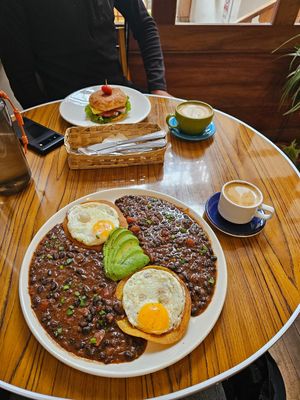 Oat milk coffee, huevos rancheros at Cafe de Nucallacta in Cuenca