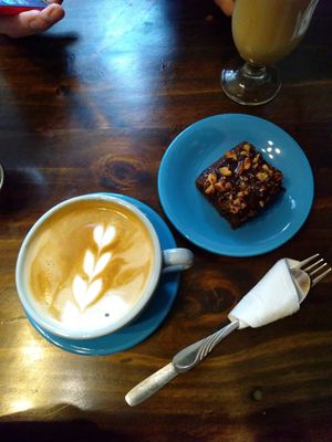 Almond milk latte and banana choc peanut brownie at Cafe de Nucallacta in Cuenca