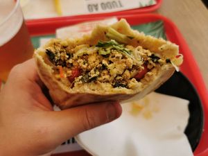 Tofu pita/wrap but I ate half of it to show you the tofu. It's a kinda fishy taste to it, quite nice really. at Pao Pao Queijo Queijo in Lisbon