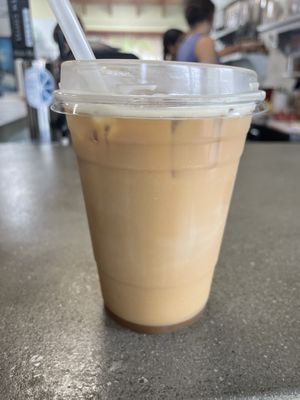 Nitro cold brew w house made oat milk and house made vanilla syrup   at High Tide Juice Co. in Westerly