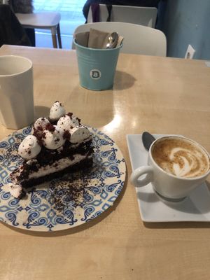 Red velvet cake and oat cortado at Plan Bakery Cafe in Tenerife