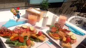 Really nice vegan Brunch!! Tom-moz, joghurt, quiche, tortilla, juice of the day, coffee, cake and and and:)  at Plan Bakery Cafe in Tenerife