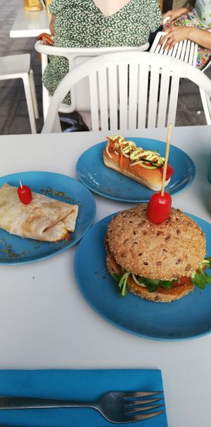 Vegan burger, wrap with carrot kind of sauce and beetroot hotdog at Plan Bakery Cafe in Tenerife