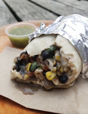 Veggie burrito w/ green salsa at Laughing Planet Cafe in Bloomington